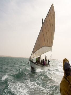 Traditional Imraguen sailing boat on the sea at Banc d'Arguin National Park