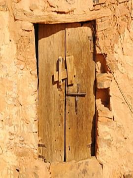 Carved wooden door in the old town of Chinguetti